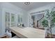 Office space with hardwood floors, large windows, a modern desk, and ample natural light at 2729 Clemson Ave, Charlotte, NC 28205