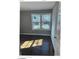Bright bedroom with natural light and hardwood flooring, perfect for relaxation at 2831 Denview Ln, Charlotte, NC 28208