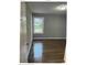 Cozy bedroom featuring hardwood floors and neutral walls, ready for personalization at 2831 Denview Ln, Charlotte, NC 28208