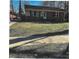 Charming brick home featuring a well-kept lawn and a cozy, inviting exterior at 2831 Denview Ln, Charlotte, NC 28208