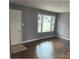 Inviting living room boasting hardwood floors and ample natural light at 2831 Denview Ln, Charlotte, NC 28208