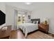 Comfortable bedroom with neutral decor, a cozy bed, and plenty of natural light at 3036 Palm Ave, Charlotte, NC 28205