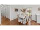 Bright dining area with modern table, chairs and large windows offering great light and views at 3036 Palm Ave, Charlotte, NC 28205