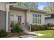 Charming modern home with a blue front door, manicured landscaping, and contemporary design at 3036 Palm Ave, Charlotte, NC 28205