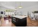 Open floor plan from kitchen island looking into the living room at 3036 Palm Ave, Charlotte, NC 28205