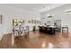 Open kitchen with stainless steel appliances, a central island, and dining area at 3036 Palm Ave, Charlotte, NC 28205