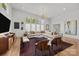Bright living room with large windows, hardwood floors, and stylish contemporary decor at 3036 Palm Ave, Charlotte, NC 28205