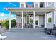 Inviting back porch with comfortable seating and serene views of the lush greenery, perfect for relaxation at 3068 Green Acres Ln, Claremont, NC 28610