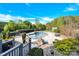 A backyard pool and patio provide a private oasis for relaxation and entertainment surrounded by lush landscaping at 3068 Green Acres Ln, Claremont, NC 28610