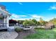 Expansive backyard with a deck, lush lawn, and fenced pool area, perfect for outdoor enjoyment at 3068 Green Acres Ln, Claremont, NC 28610