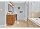 Inviting bathroom features a spacious vanity, soaking tub, and neutral color palette at 3068 Green Acres Ln, Claremont, NC 28610