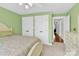 Relaxing bedroom featuring a bed, closet, and doorway leading to another room at 3068 Green Acres Ln, Claremont, NC 28610