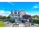 Stately two-story home with a backyard hot tub, deck, and manicured lawn, perfect for outdoor living at 3068 Green Acres Ln, Claremont, NC 28610