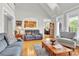 Comfortable living room with hardwood floors, neutral tones, and ample seating for relaxation at 3068 Green Acres Ln, Claremont, NC 28610