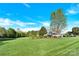 A spacious lot with a large lawn and beautiful landscaping complements this lovely home at 3068 Green Acres Ln, Claremont, NC 28610