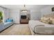 This light-filled bedroom features two closets and a soft color palette for a bright and airy feel at 311 Mcalway Rd, Charlotte, NC 28211