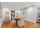 Well-lit dining room featuring hardwood floors, elegant lighting, and ample space for Gathering gatherings at 311 Mcalway Rd, Charlotte, NC 28211