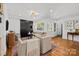 Comfortable living room area with ample seating and modern decor at 311 Mcalway Rd, Charlotte, NC 28211