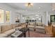 Open concept living space flowing from the kitchen with natural light at 311 Mcalway Rd, Charlotte, NC 28211