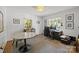Home office with dual desks, ample natural light, and a clean and functional design at 311 Mcalway Rd, Charlotte, NC 28211