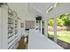 Bright studio with natural light, white walls, ample storage, and views of the beautiful backyard at 311 Mcalway Rd, Charlotte, NC 28211