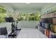 Bright sunroom offering a tranquil space for exercise with ample natural light and scenic views at 311 Mcalway Rd, Charlotte, NC 28211