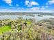 Beautiful aerial view of the property with a lake in the background and blue skies above at 32 Heritage Ln, Shelby, NC 28150