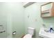 Quaint bathroom features a toilet, sink and vintage mirror with neutral paint scheme at 32 Heritage Ln, Shelby, NC 28150