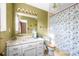 Bathroom with a vanity, toilet and bath/shower with bright overhead vanity lighting at 32 Heritage Ln, Shelby, NC 28150