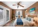 Cozy bedroom with a queen bed, complemented by French door access, and a tranquil color scheme at 32 Heritage Ln, Shelby, NC 28150