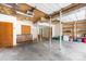 Large garage with ample workspace, shelving and storage cabinets for all your projects at 32 Heritage Ln, Shelby, NC 28150