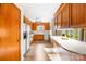 Functional kitchen featuring wooden cabinetry, ample counter space, and appliances, ideal for meal preparation at 32 Heritage Ln, Shelby, NC 28150