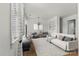 Bright living room featuring modern decor, hardwood floors, and large windows with lots of natural light at 343 Wakefield Dr # C, Charlotte, NC 28209