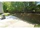 A spacious backyard with a concrete patio and AC unit at 346 Cornielle Ln, Charlotte, NC 28216