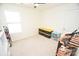 Bedroom featuring a window, storage bins, and shoe racks at 346 Cornielle Ln, Charlotte, NC 28216