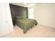 A modern bedroom features a queen bed, neutral carpet and paint and plenty of natural light at 346 Cornielle Ln, Charlotte, NC 28216