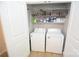 Washer and dryer conveniently located in a closet with shelving at 346 Cornielle Ln, Charlotte, NC 28216