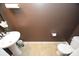 Compact powder room with pedestal sink and neutral-toned walls, a functional space for guests at 346 Cornielle Ln, Charlotte, NC 28216