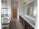 Bathroom features a soaking tub, shower, double vanity, and walk-in closet at 4038 Gardenia Dr # 0114, Harrisburg, NC 28075