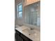 Bathroom features a spacious vanity with a large mirror and shower at 4038 Gardenia Dr # 0114, Harrisburg, NC 28075