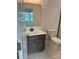 Bathroom with stylish vanity, modern mirror and lighting at 4038 Gardenia Dr # 0114, Harrisburg, NC 28075