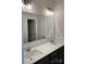 Bathroom with double vanity, stylish mirror, and modern sinks at 4038 Gardenia Dr # 0114, Harrisburg, NC 28075