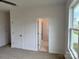 Main bedroom with carpet, walk in closet, and ensuite bathroom at 4038 Gardenia Dr # 0114, Harrisburg, NC 28075