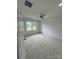 Bedroom with neutral carpet and plenty of natural light from the large window at 4038 Gardenia Dr # 0114, Harrisburg, NC 28075