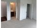 Bedroom featuring neutral carpet, closet, and bathroom at 4038 Gardenia Dr # 0114, Harrisburg, NC 28075