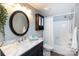 Bathroom featuring a modern vanity with marble countertop and updated fixtures at 405 W 7Th St # 408, Charlotte, NC 28202