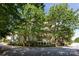 Picturesque apartment building with large green trees at 405 W 7Th St # 408, Charlotte, NC 28202