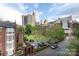 An exterior shot showing the building and cityscape at 405 W 7Th St # 408, Charlotte, NC 28202