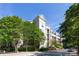 Condo with beautiful landscaping, balconies, and a manicured lawn at 405 W 7Th St # 408, Charlotte, NC 28202