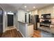 Kitchen featuring granite countertops, stainless steel appliances, and a view into the entryway at 405 W 7Th St # 408, Charlotte, NC 28202